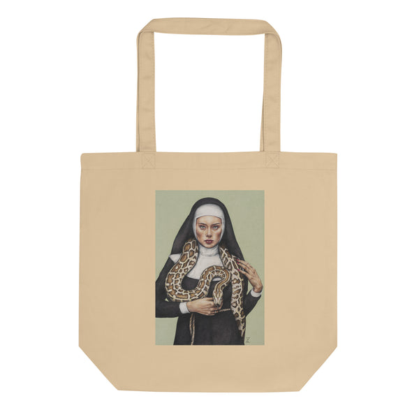 organic cotton tote bag with nun art of a nun holding a snake on a green background