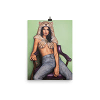 An 12 inch by 16 inch museum quality liana z weber artworks original poster. beautiful and affordable wall art of a strong female sitting, leaning back in a purple chair against a soft light green background. She is wearing a lion headdress and is staring boldly at the viewer. She is the female version of the legendary mythological character Hercules. A strong and badass woman that needs no one and is self assured.